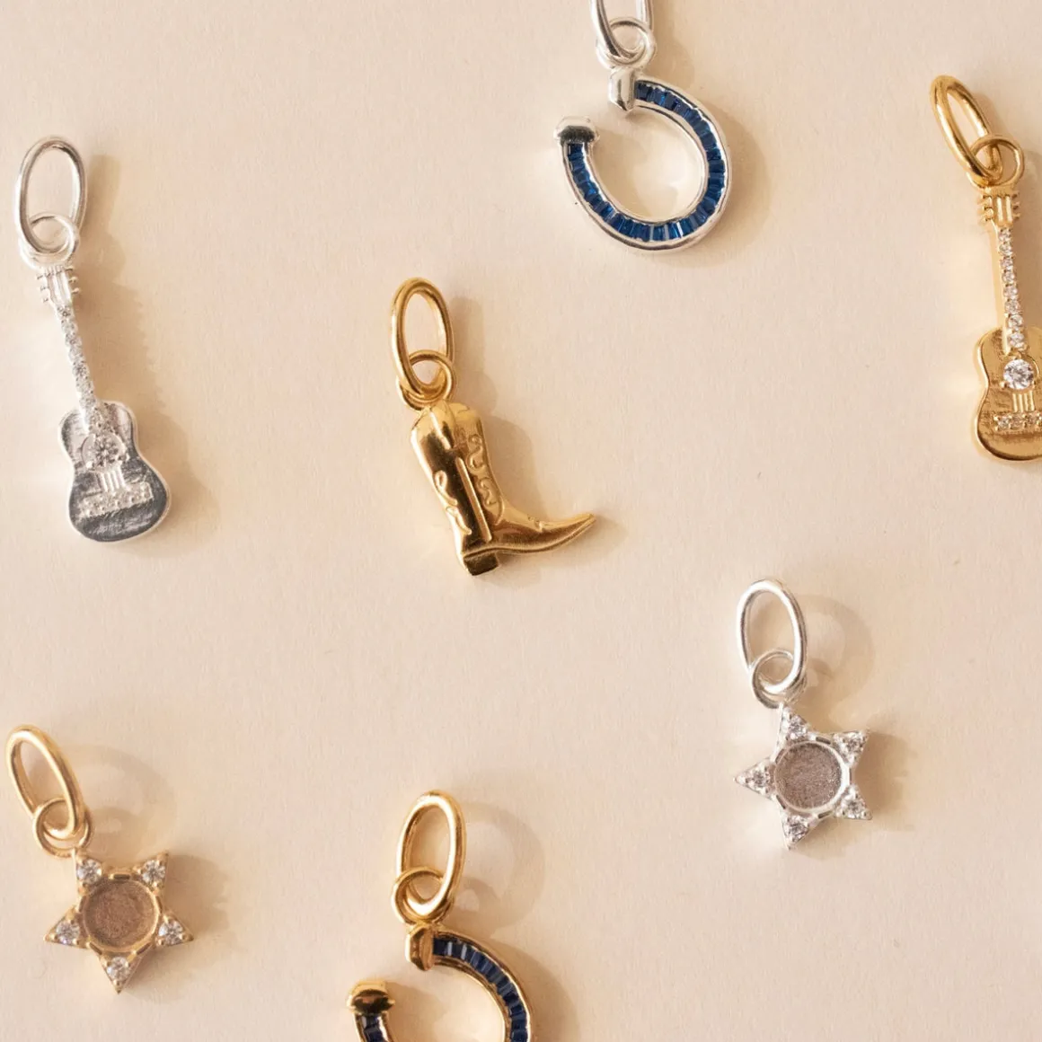 LOYAL CRYSTAL HORSESHOE CHARM - BLUE CUBIC ZIRCONIA