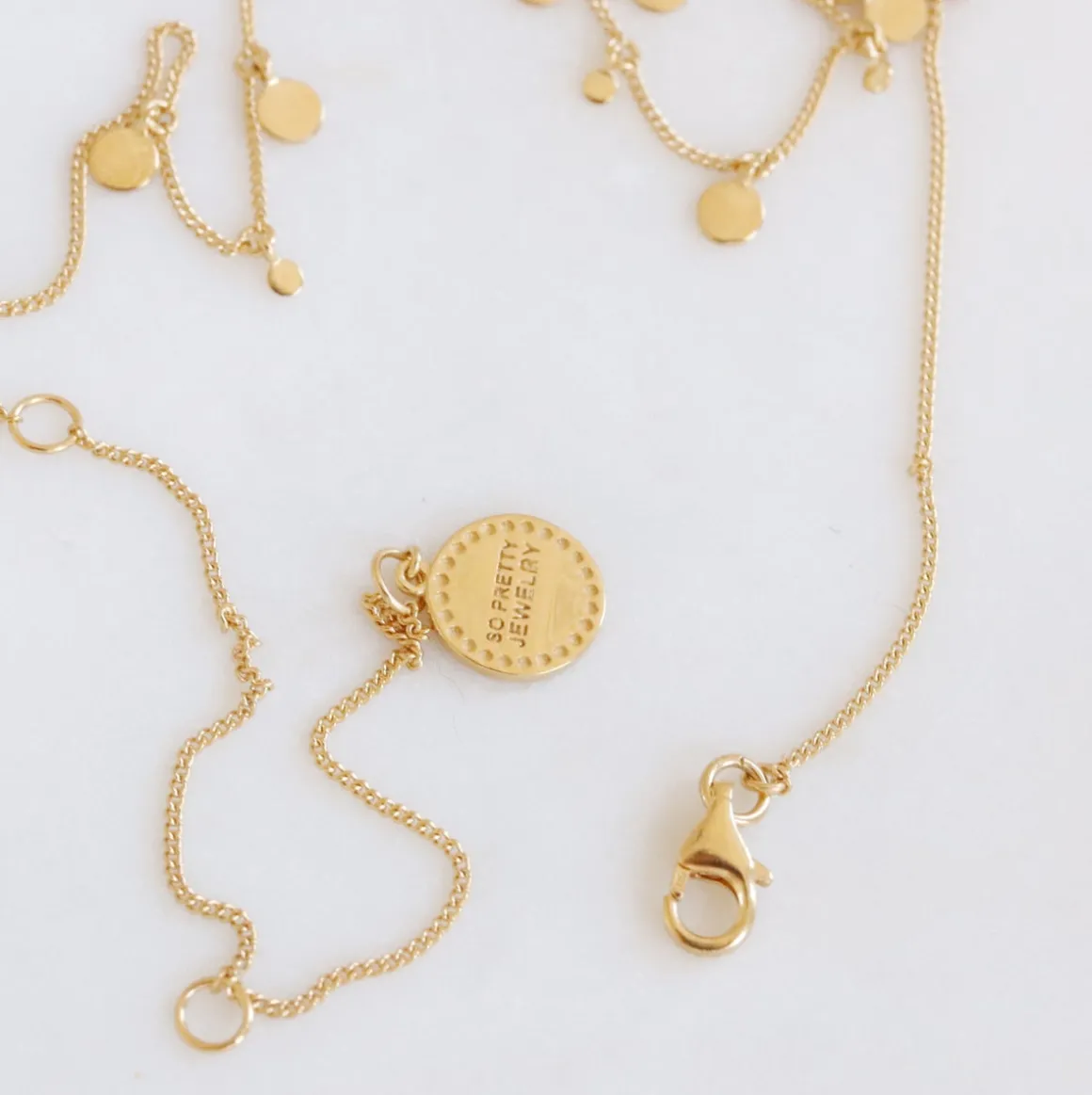 POISE MULTI DISK NECKLACE - CUBIC ZIRCONIA