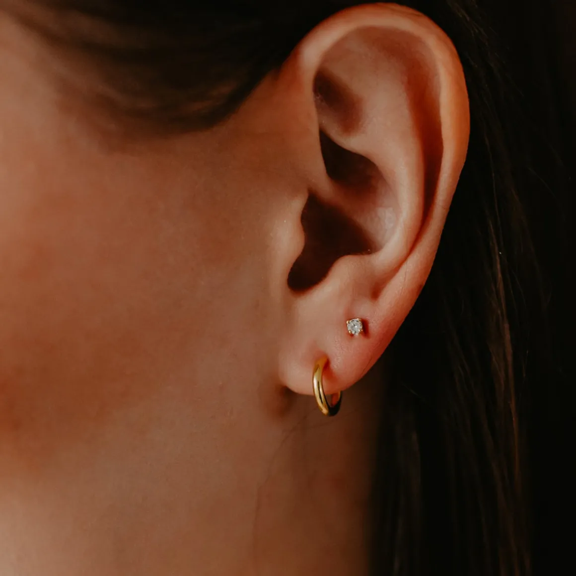 TINY POISE HUGGIE HOOPS - GOLD